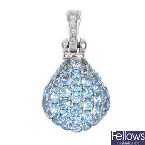 An 18ct gold aquamarine and diamond pendant.