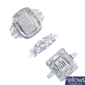 A selection of three platinum and 14ct gold diamond and cubic zirconia rings. 