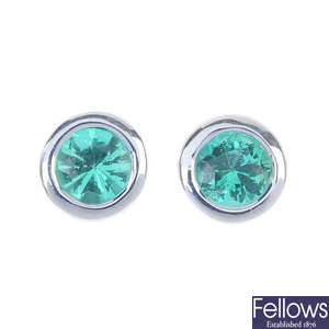 A pair of emerald ear studs.