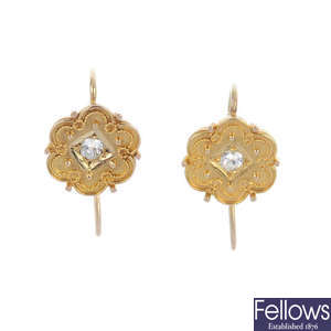 A pair of early 20th century 15ct gold diamond earrings.