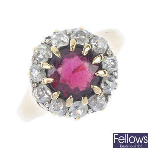 An early 20th century 18ct gold garnet and diamond cluster ring.