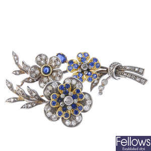A sapphire and diamond floral brooch.