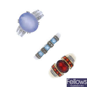 A selection of three gold gem-set and diamond rings.