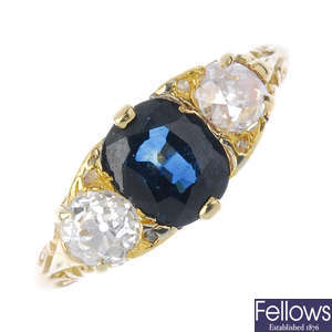 A late Victorian 18ct gold sapphire and diamond three-stone ring.