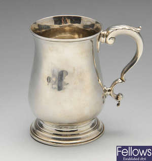 A George III silver mug by John Scofield.