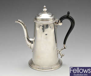 An Edwardian silver coffee pot.