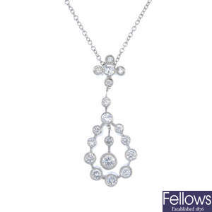 A diamond pendant, with chain.