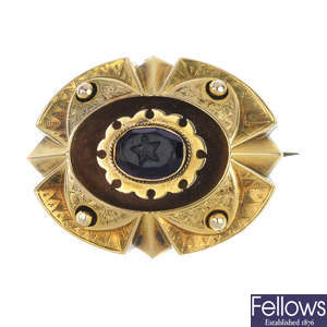 A late 19th century gold paste brooch.