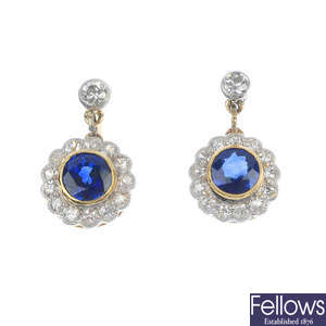 A pair of sapphire and diamond cluster ear pendants. 