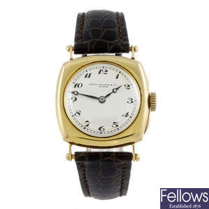 PATEK PHILIPPE - a gentleman's yellow metal wrist watch.