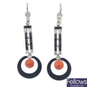 A pair of coral, onyx and diamond ear pendants.