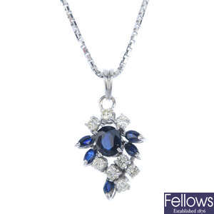An 18ct gold sapphire and diamond cluster pendant. 