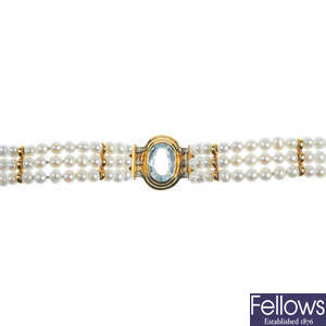 A topaz, diamond and cultured pearl bracelet. 