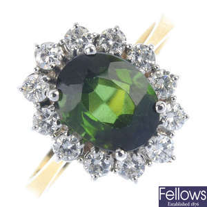 An 18ct gold tourmaline and diamond cluster ring. 