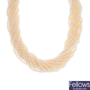 MIKIMOTO - a cultured pearl torsade necklace, with 18ct gold clasp.