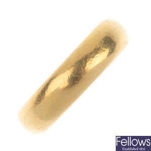 A 1970s 22ct gold band ring. 