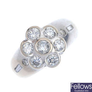 An 18ct gold diamond floral cluster ring. 