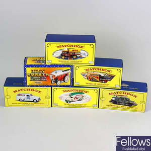 A box containing 50 Matchbox Models of Yesteryear diecast model cars and other vehicles