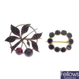 Two garnet brooches.