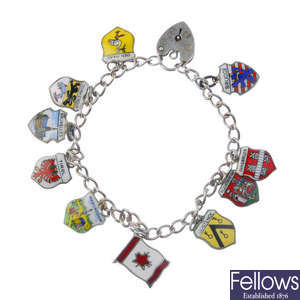 A selection of charm bracelets and loose charms.