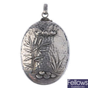 A late 19th century Aesthetic period American silver locket.