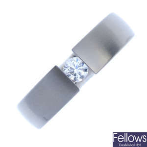 A gentleman's diamond single-stone ring. 