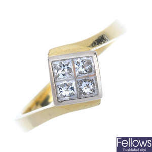 An 18ct gold diamond four-stone ring.