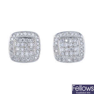 A pair of 14ct gold diamond earrings.