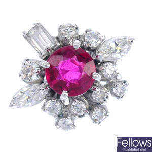A synthetic ruby and diamond cluster ring. 