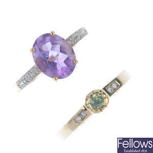 A selection of four 9ct gold diamond and gem-set rings.