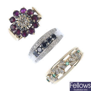 A selection of three 9ct gold diamond and gem-set dress rings.