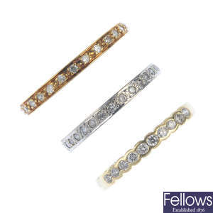 A selection of three diamond eternity rings. 
