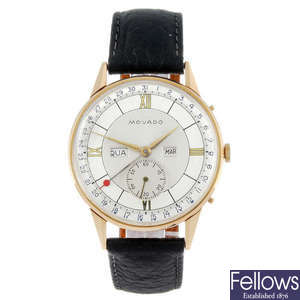 MOVADO - a gentleman's rose metal triple date wrist watch.