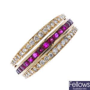 A sapphire, ruby and diamond full-circle eternity ring. 