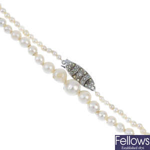 A cultured pearl and paste necklace.