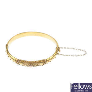 A late Victorian gold hinged bangle.