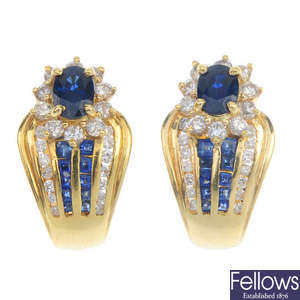 A pair of sapphire and diamond earrings.