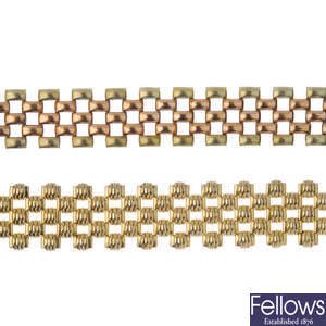 Two fancy-link five-row bracelets.