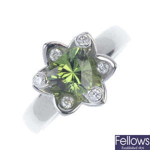 A demantoid garnet and diamond floral cluster ring. 