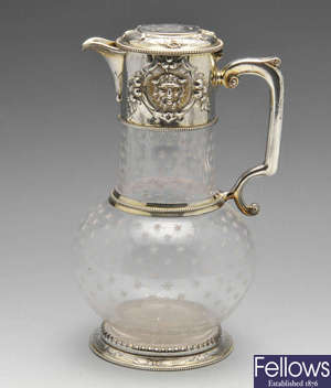 A mid-Victorian silver mounted glass claret jug.