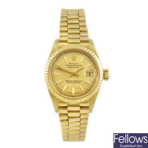 ROLEX - a lady's 18ct yellow gold Oyster Perpetual Datejust bracelet watch.
