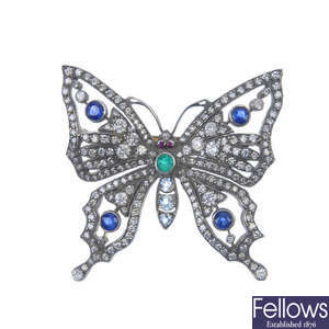A mid 20th century diamond and gem-set butterfly brooch.
