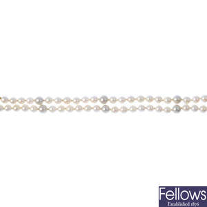 A cultured pearl double-row bracelet, with 14ct gold clasp.