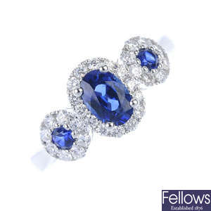 A sapphire and diamond triple cluster ring.