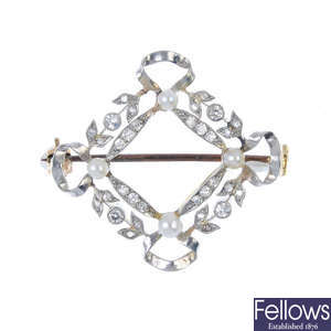 An early 20th century gold and platinum seed pearl and diamond brooch.