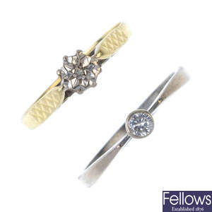 A selection of four 18ct gold diamond rings.