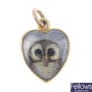 A late 19th century gold reverse carved intaglio owl pendant. 