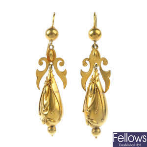 A pair of late Victorian gold ear pendants, circa 1880. 
