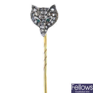 A late 19th century silver and gold diamond fox head stickpin.