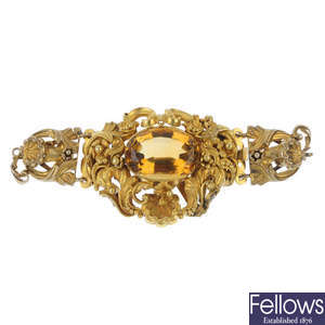 A late 19th century gold citrine clasp. 